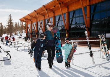 Family preparing to ski on Heavenly Mountain near Tahoe Ridge Resort in Stateline, Nevada.