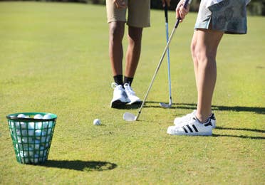 Golfers putting on course at Orange Lake Resort near Orlando, Florida