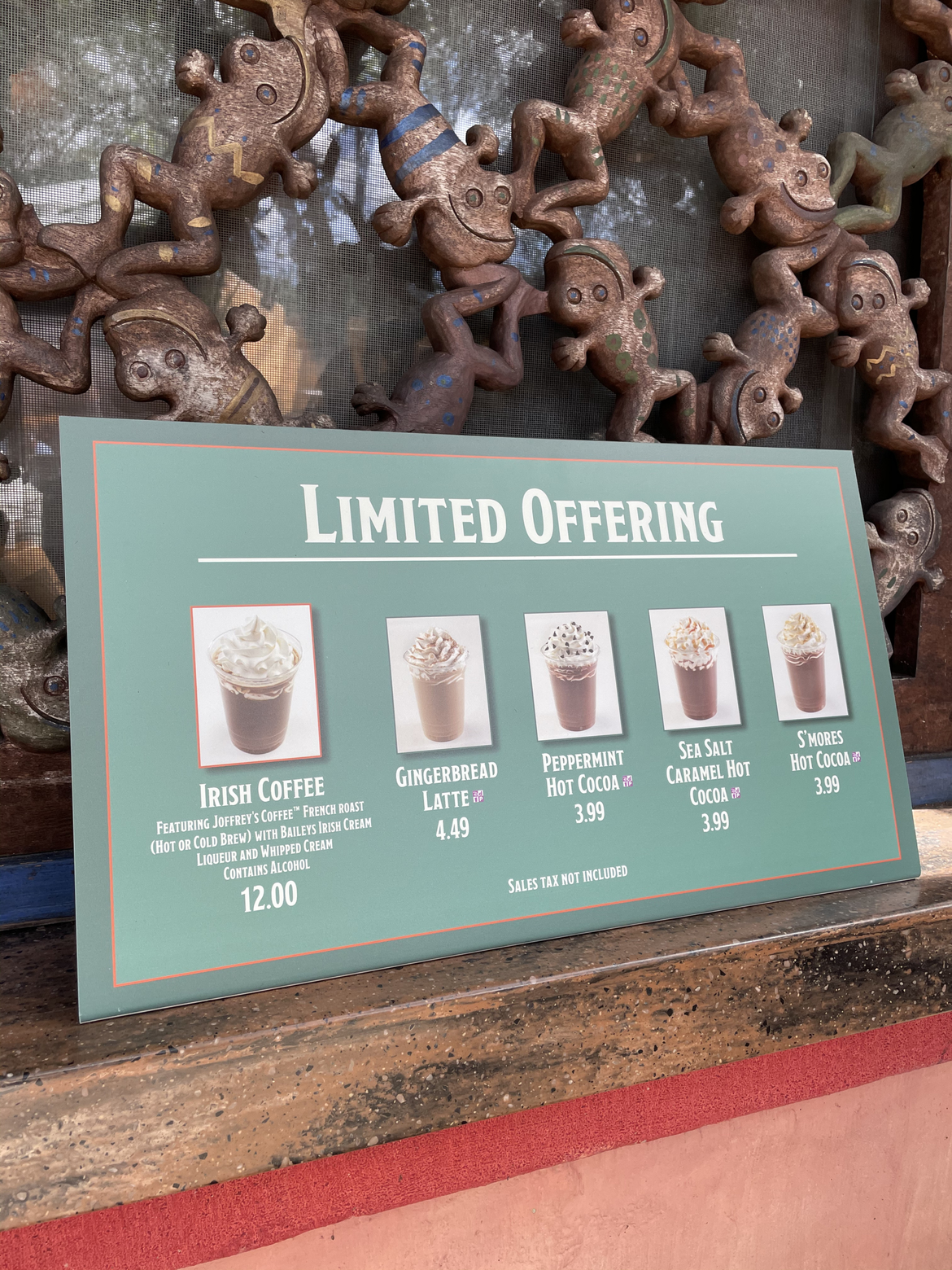 A sign that reads, 'Limited Offering' along with various latte and Hot cocoa offerings from Isle of Java at Disney's Animal Kingdom Theme Park at Walt Disney World® Resort.