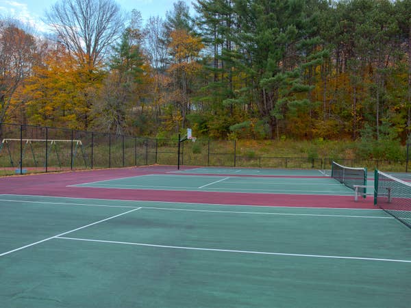 Two outdoor tennis courts at Mount Ascutney Resort in Brownsville, Vermont.