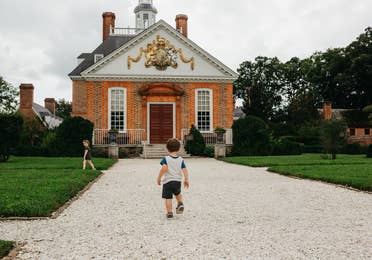 Young child exploring Colonial Williamsburg near Williamsburg, Resort.