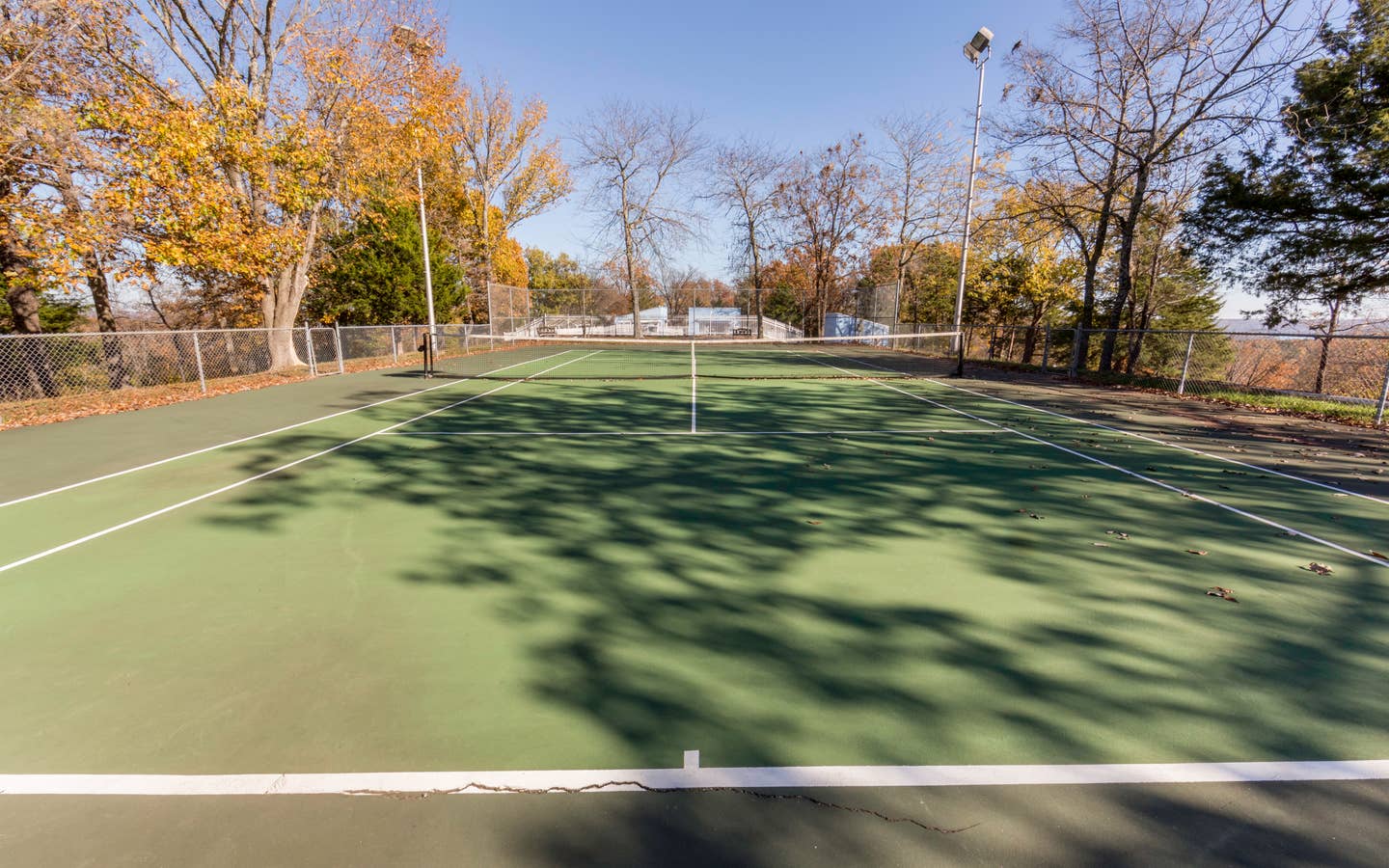 Outdoor tennis court at Ozark Mountain Resort in Kimberling City, Missouri.