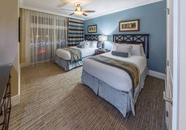 Bedroom with two beds in a Signature Collection Villa at Smoky Mountain Resort in Gatlinburg, Tennessee.