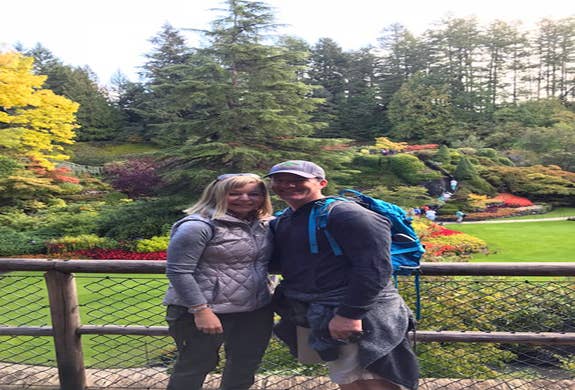 Enjoying the gardens with my husband on vacation in Canada