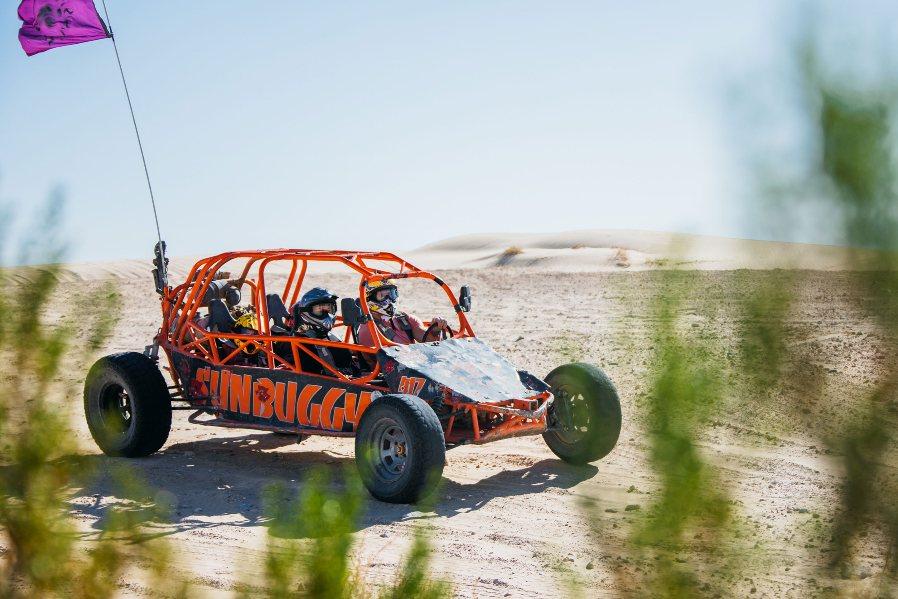 The Haby family wear safety helmets while driving their Sunbuggy in the sandy dunes near our Desert Club Resort located in Las Vegas, Nevada.