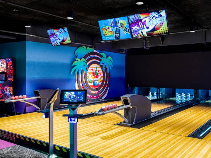 Kids bowling in arcade at Orange Lake Resort near Orlando, Florida