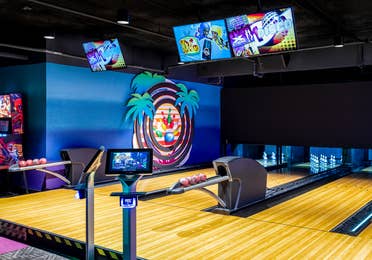 Kids bowling in arcade at Orange Lake Resort near Orlando, Florida