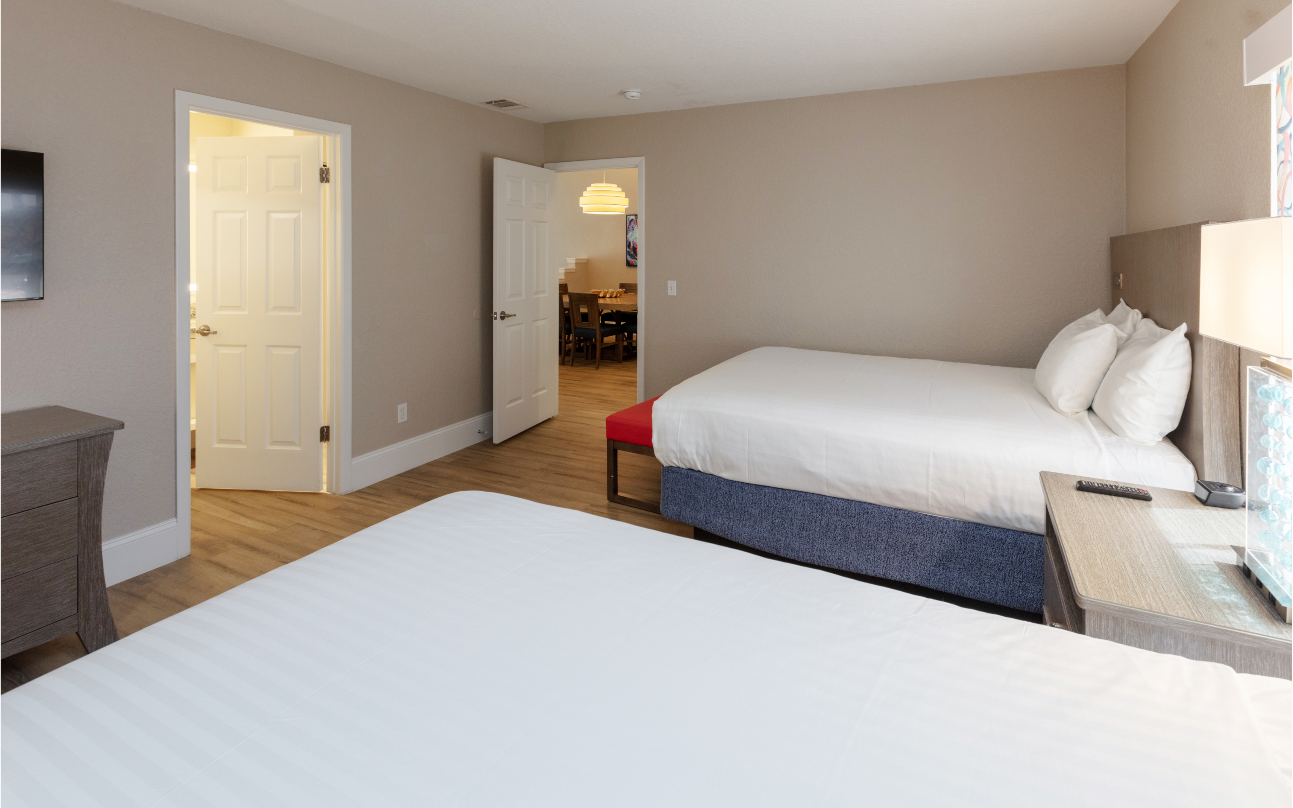 Bed with two night stands in a villa in West Village at Orange Lake Resort near Orlando, FL