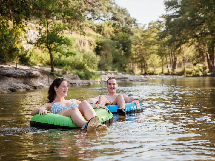 Couple floating at Canyon Lake, TX