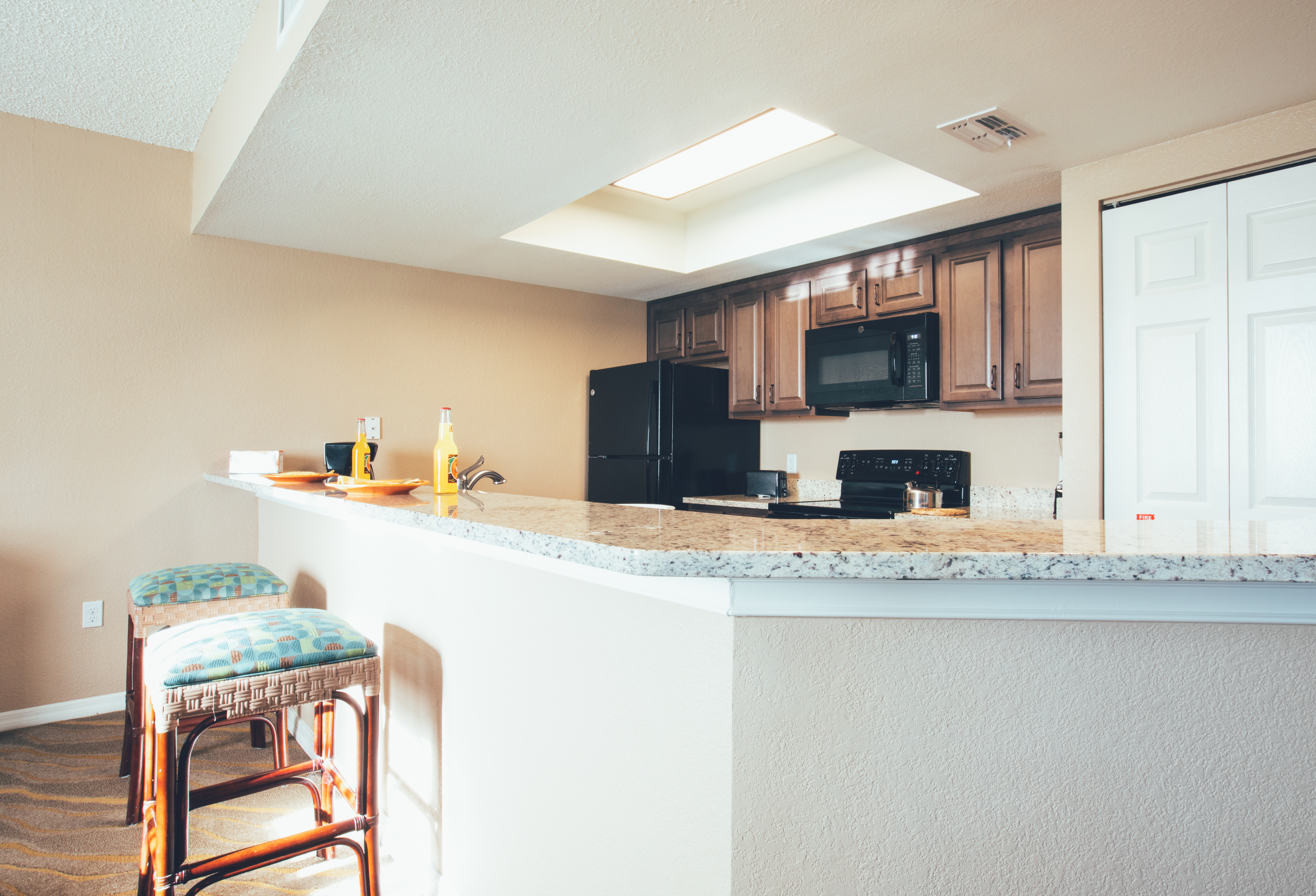 Kitchen bar with two stools in a villa in North Village at Orange Lake Resort near Orlando, Florida