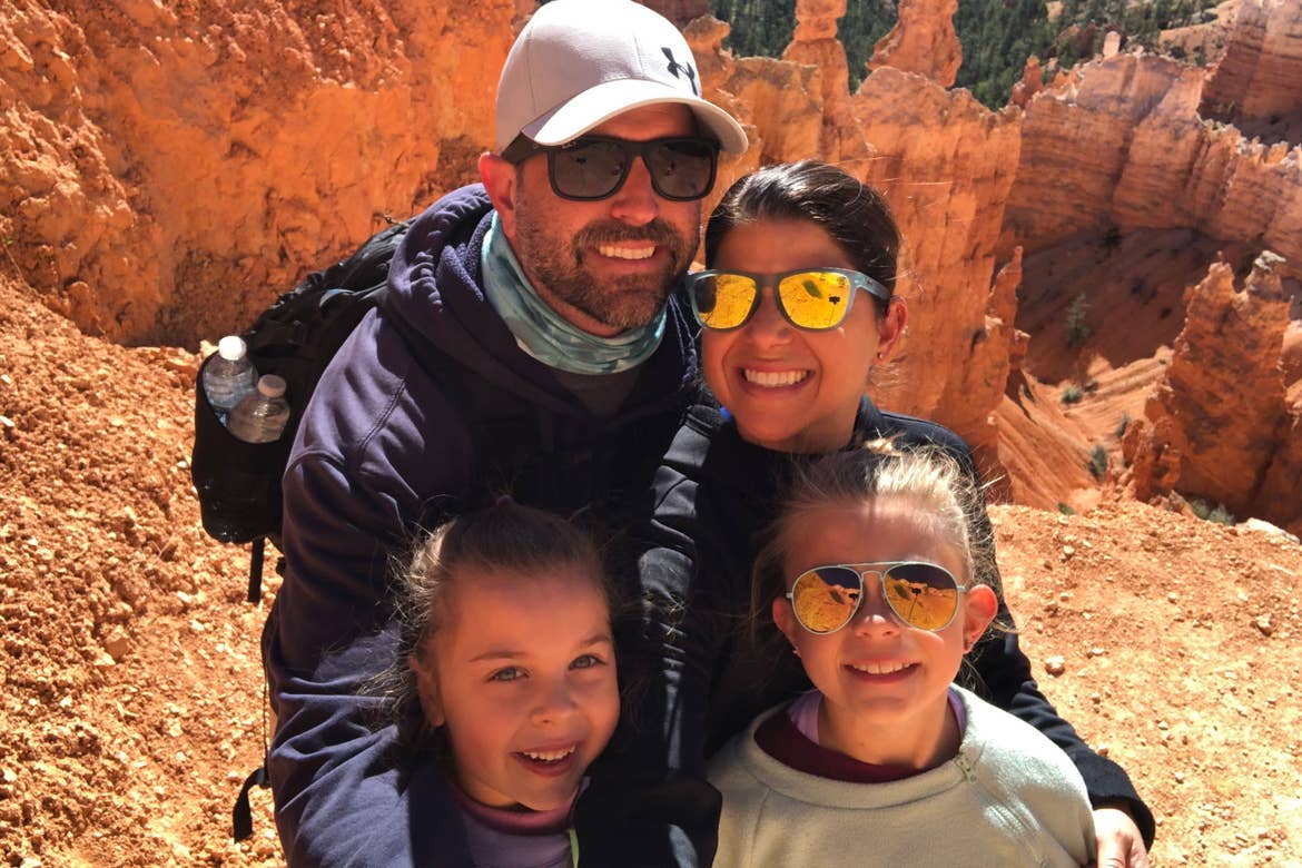 Chris (top-right) and Josh (top-left) pose with Kyndall (Bottom-right) and Kyler (bottom-left) in front of Red Rock formations from Capitol Reef National Park.