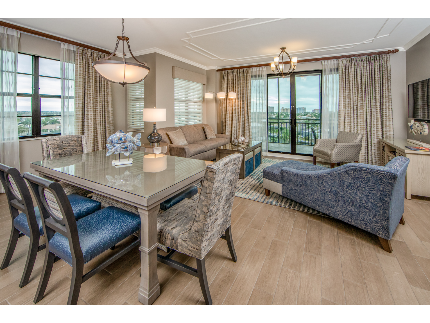 Signature villa living room at Sunset Cove Resort, featuring spacious seating and modern decor.