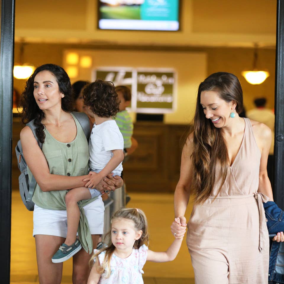 Family leaving check-in to visit their villa at Orange Lake Resort near Orlando, Florida