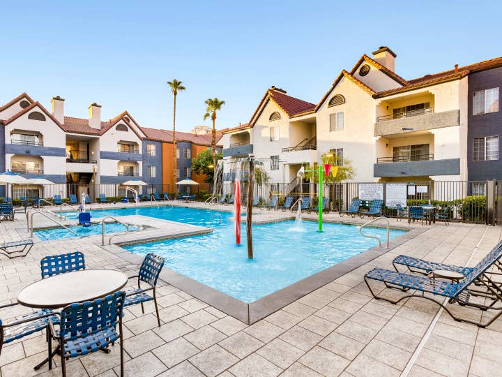 Pool with seating at Desert Club Resort.