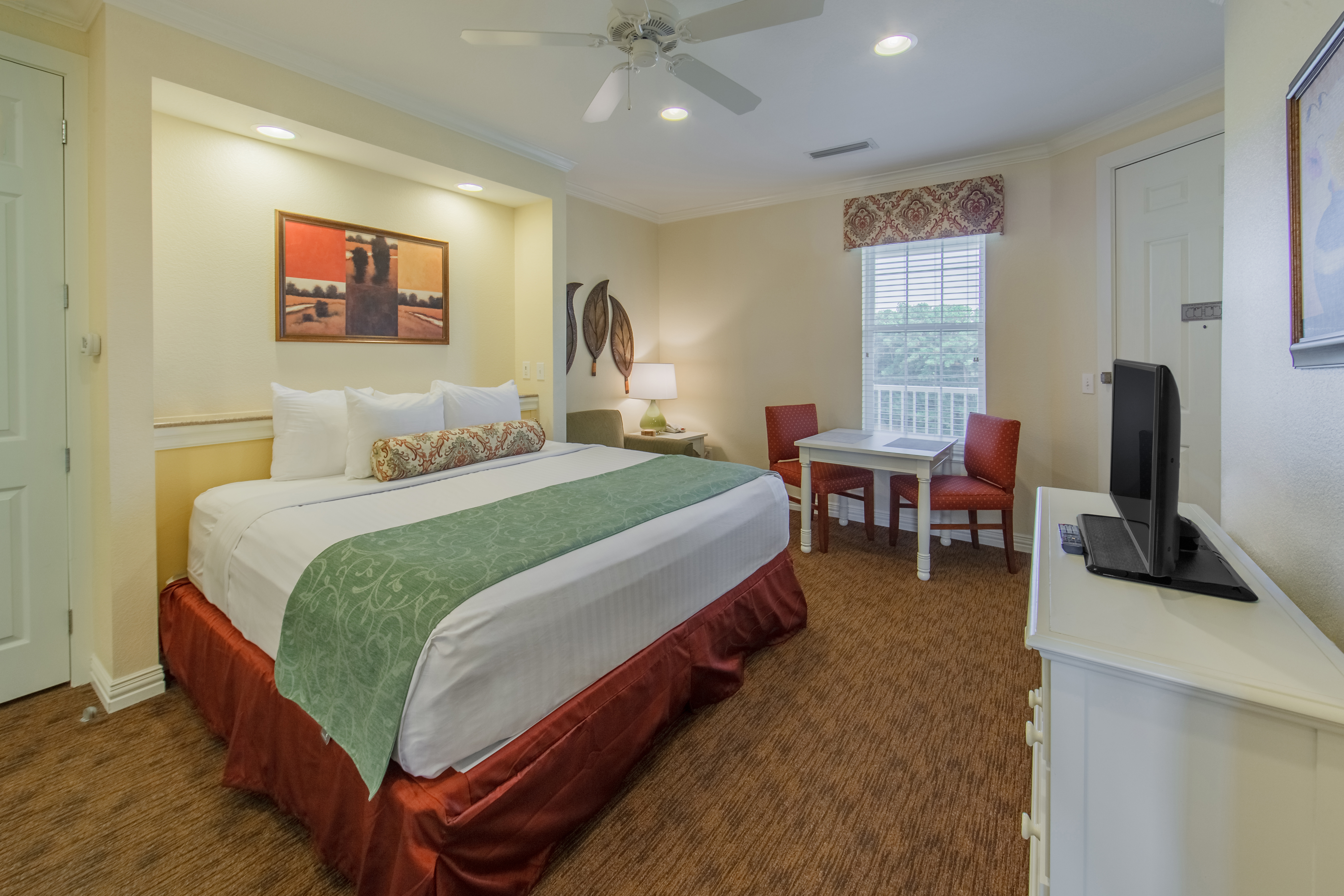 Bedroom in a two-bedroom presidential villa at Villages Resort