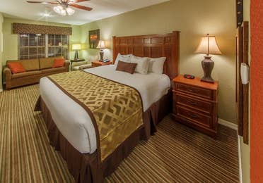King bed in a studio room at Piney Shores Resort in Conroe, Texas