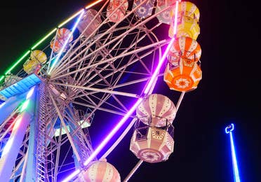 Nighttime view of the ferris wheel at Old Town, Kissimmee, FL near Orange Lake Resort.
