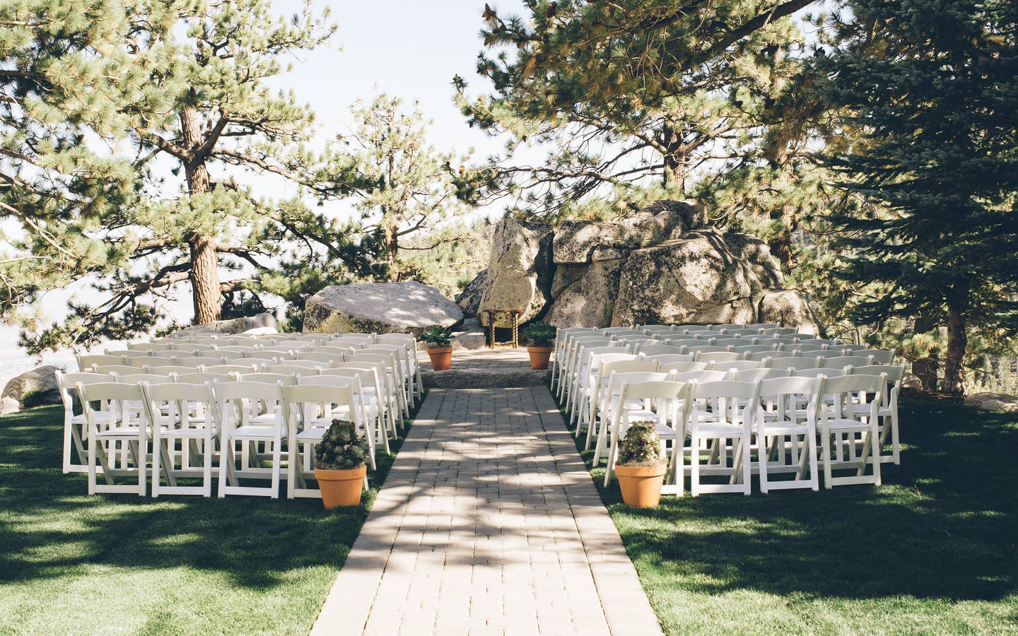 White chairs set up for a wedding ceremony