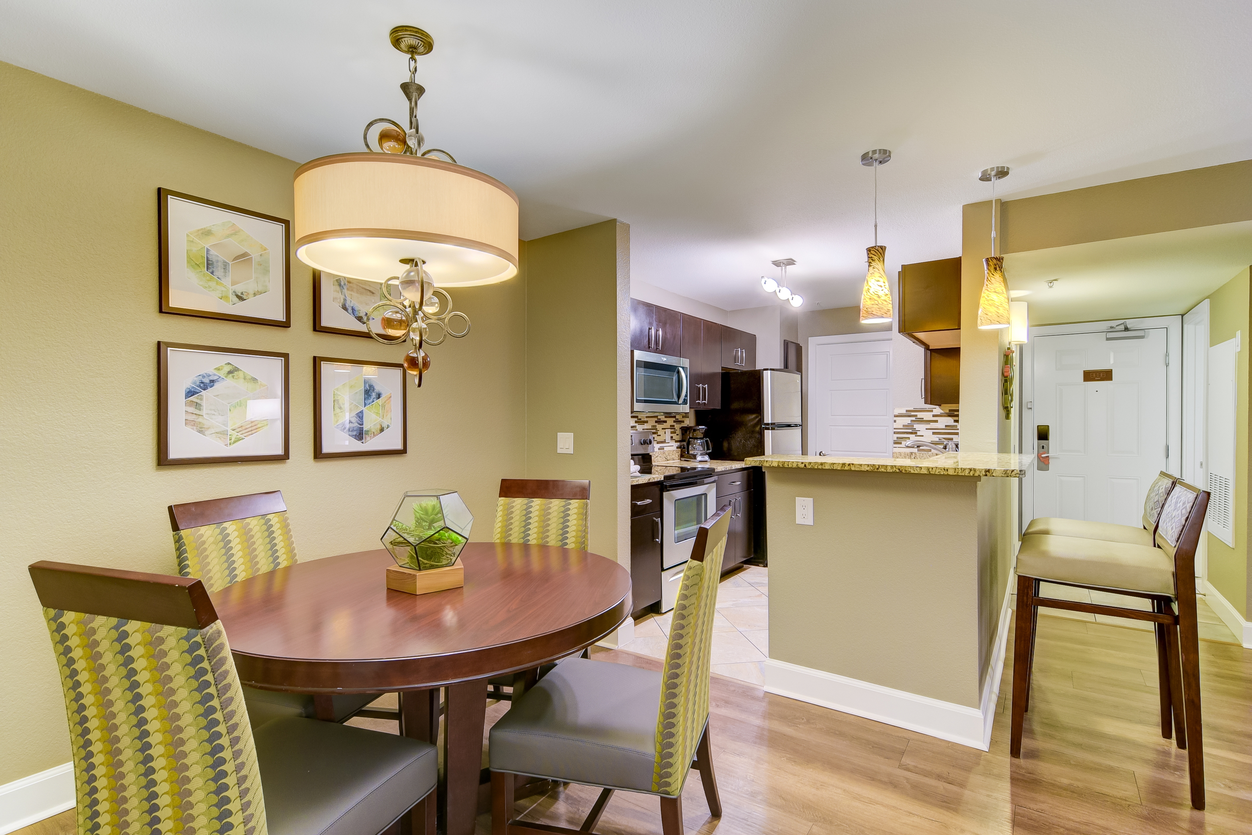 Kitchen and dining area in a two-bedroom villa at Desert Club Resort in Las Vegas
