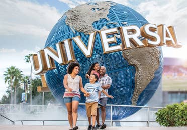 Family of four at Universal Orlando Resort near Orange Lake Resort in Orlando, Florida