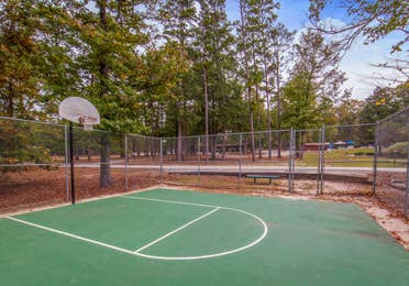 Outdoor basketball court at Holly Lake Ranch in Texas.