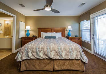 Bedroom in a two-bedroom ambassador villa at the Holiday Hills Resort in Branson Missouri.