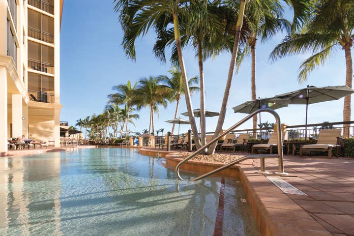 Close up view of outdoor pool entrance at Sunset Cove Resort in Marco Island, Florida.