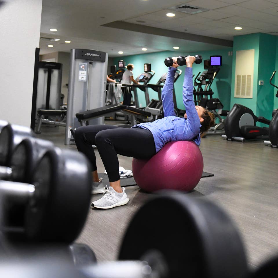 Guest exercising in fitness center at Orange Lake Resort near Orlando, Florida