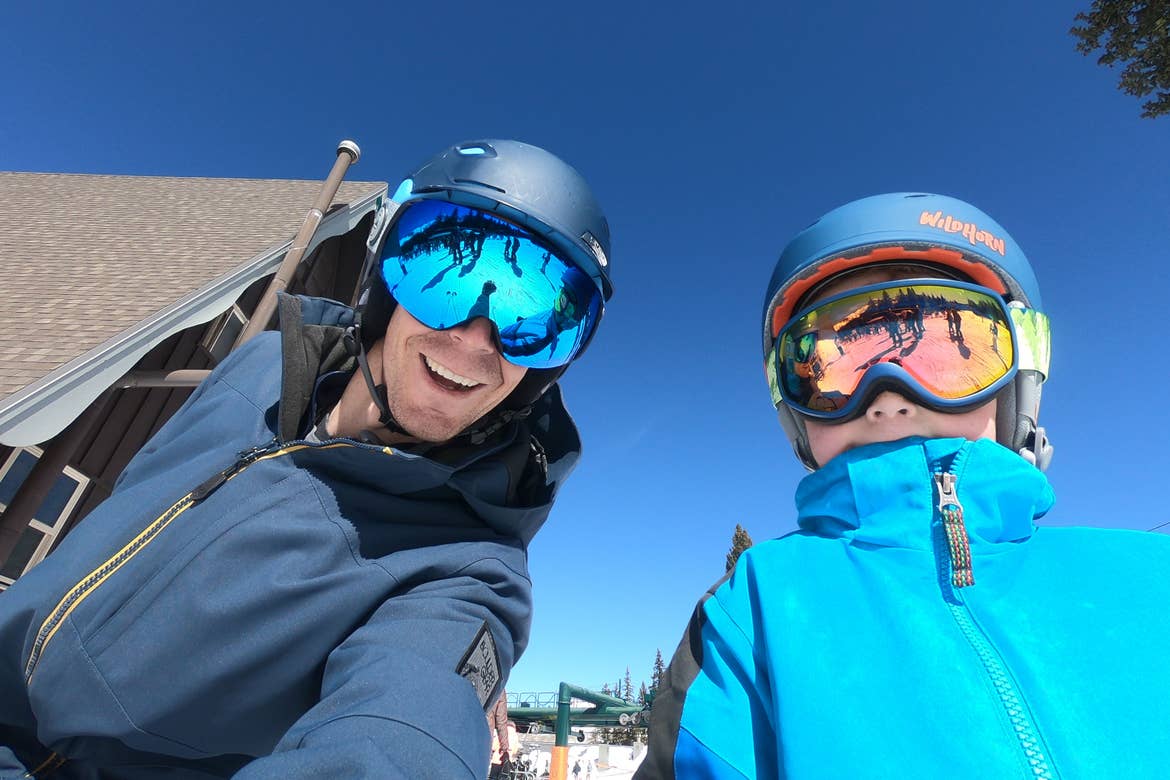 Featured Contributor, Jessica Averett's husband and son wearing protective ski goggles.