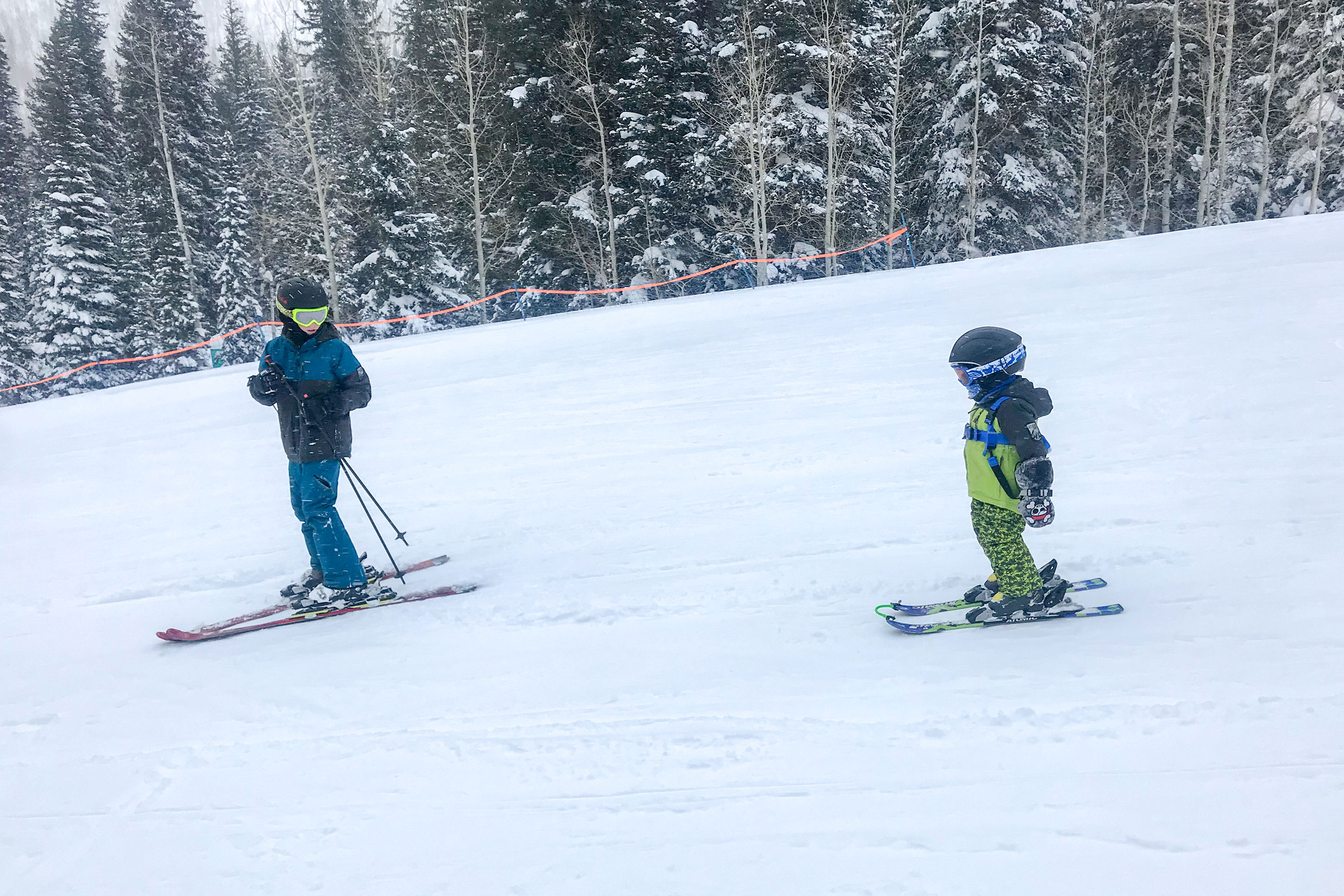 Jessica's sons learn the fundamentals in ski school on the bunny slopes.