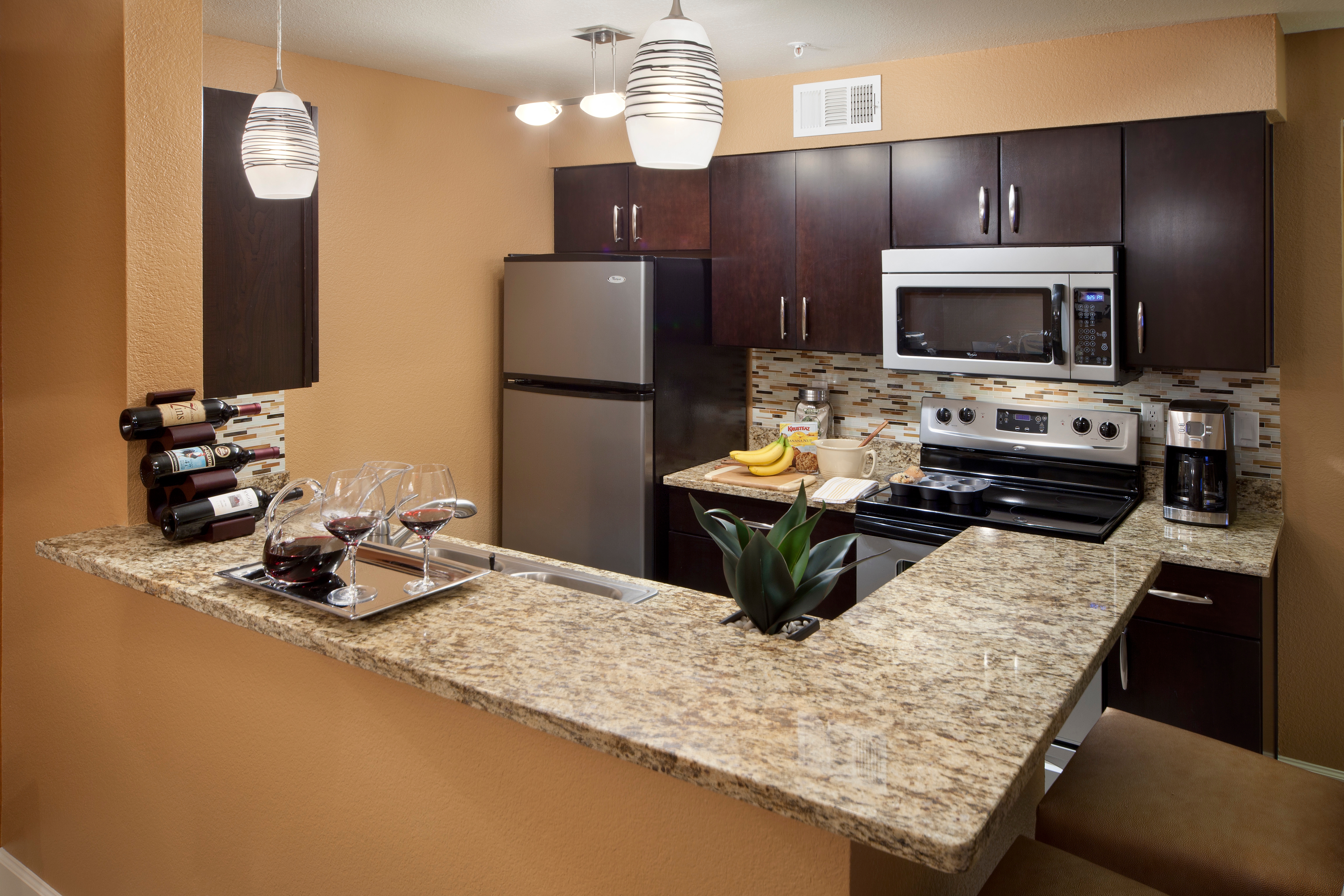 Kitchen in a one-bedroom villa at Desert Club Resort in Las Vegas