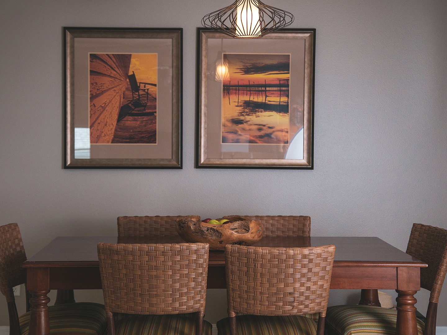 Dining room table with six chairs in a two-bedroom villa at Orlando Breeze Resort in Florida.