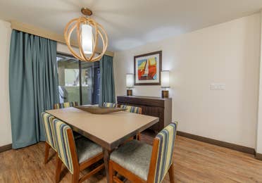 Dining room table with four chairs in a two-bedroom villa at Scottsdale Resort