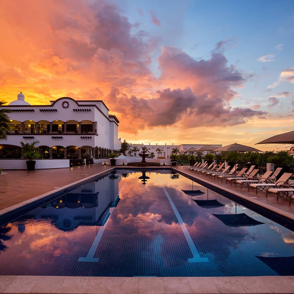 Sunset in the pool at the Grand Residences Resort in Puerto Morelos, Mexico