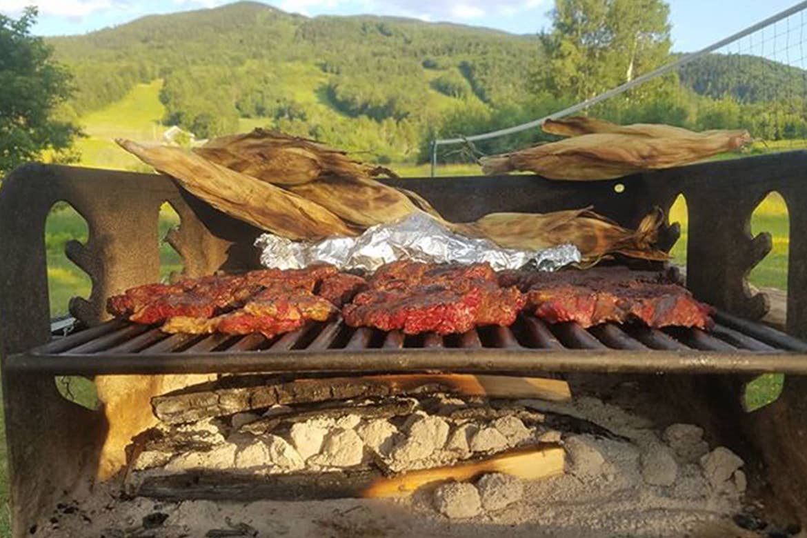 An exterior grill with different delectable meats.