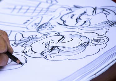 Caricatures being drawn at Cape Canaveral Beach Resort.