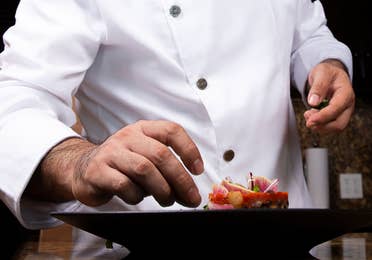 Chef making the final touch at the Grand Residences Resort in Puerto Morelos, Mexico