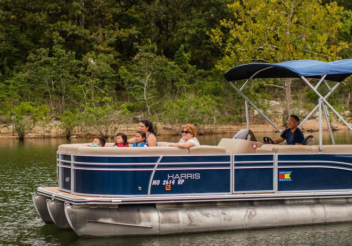 Boat on catch-and-release pond at Holiday Hills Resort in Branson, Missouri.