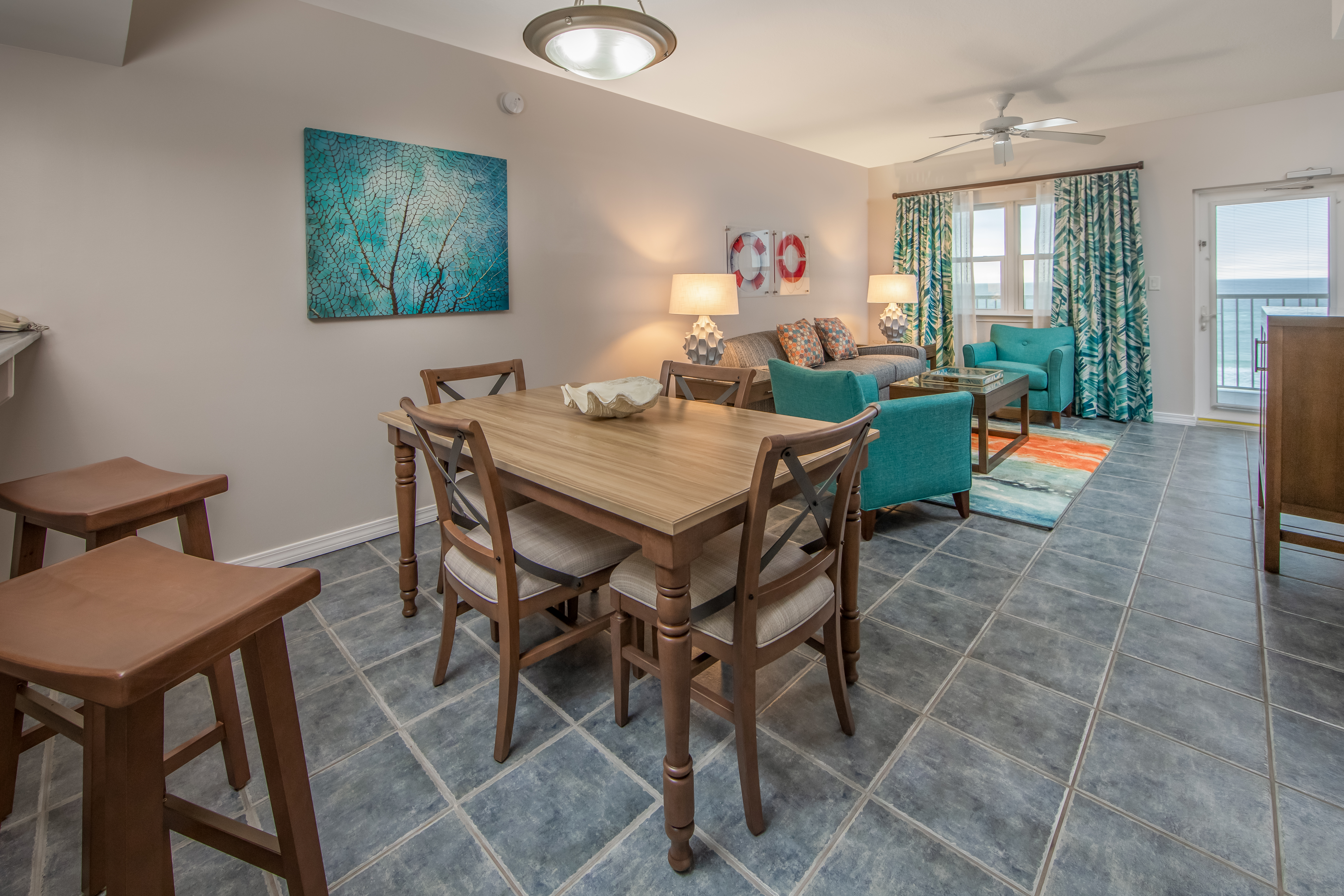 Dining room and table in a one-bedroom villa at Panama City Beach Resort
