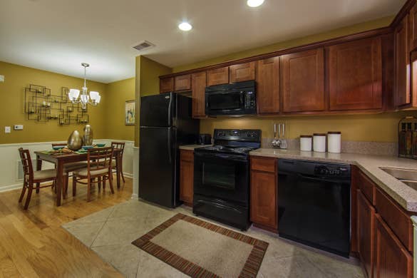 Kitchen and amenities in a three-bedroom ambassador villa at the Holiday Hills Resort in Branson Missouri.