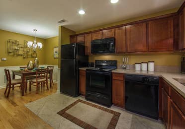 Kitchen and amenities in a three-bedroom ambassador villa at the Holiday Hills Resort in Branson Missouri.
