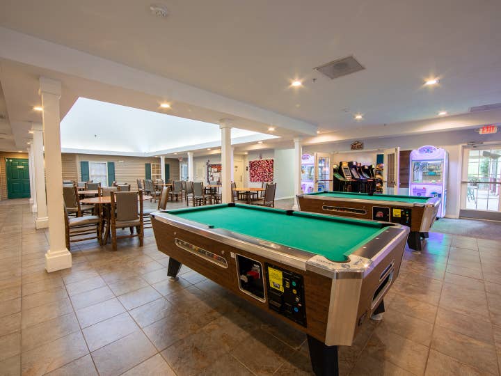 Game room with two pool tables at Fox River Resort in Sheridan, Illinois.