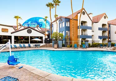 Outdoor pool with view of the Sphere at Desert Club Resort.