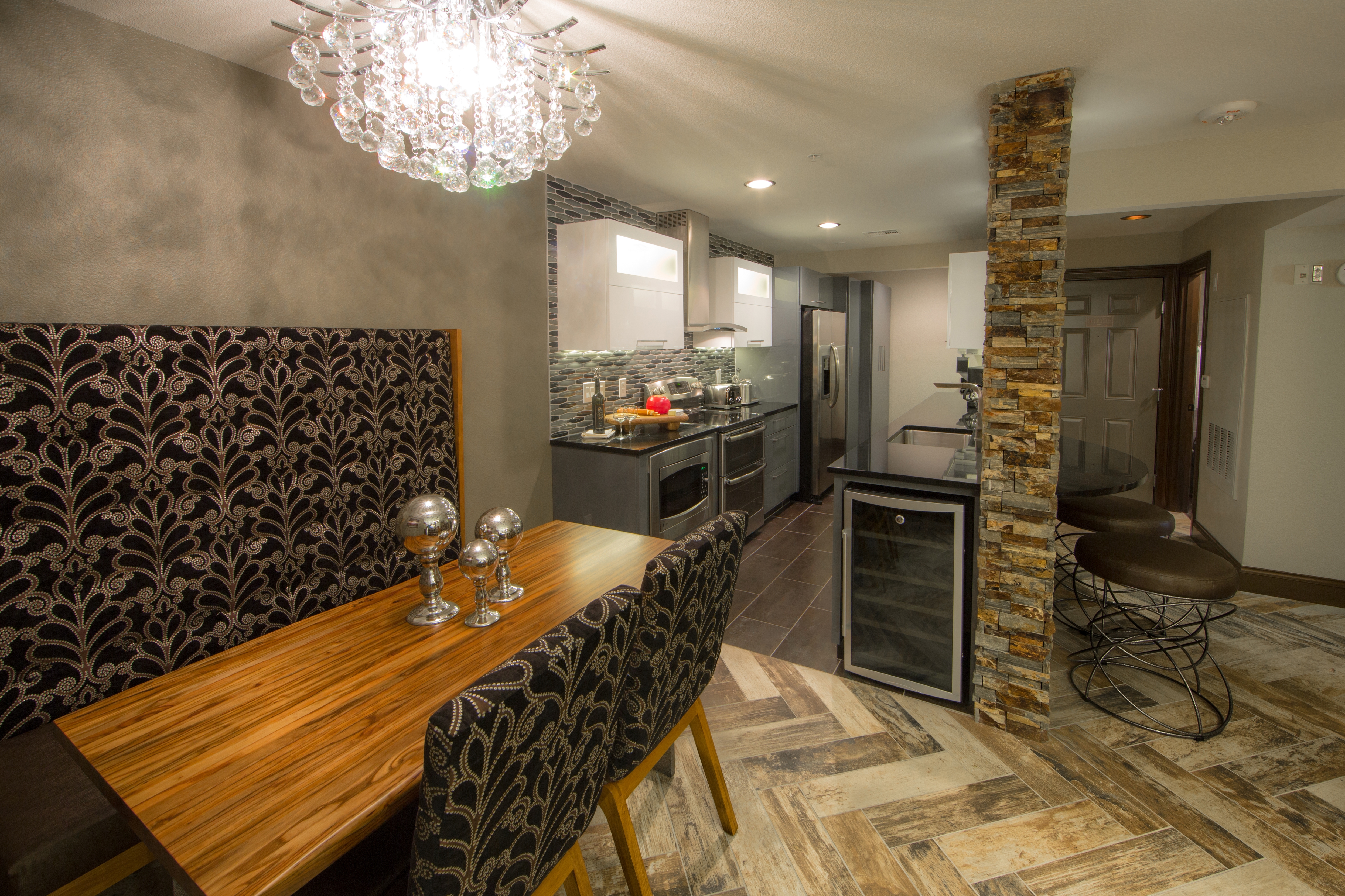 Dining area and kitchen in a two-bedroom Signature Villa at Desert Club Resort in Las Vegas