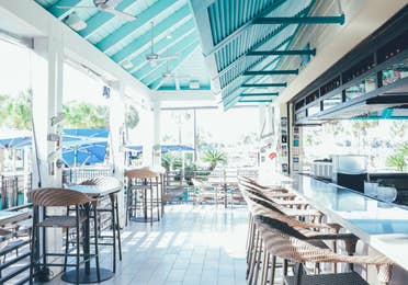 Breezes Restaurant & Bar seating area in West Village at Orange Lake Resort near Orlando, Florida.