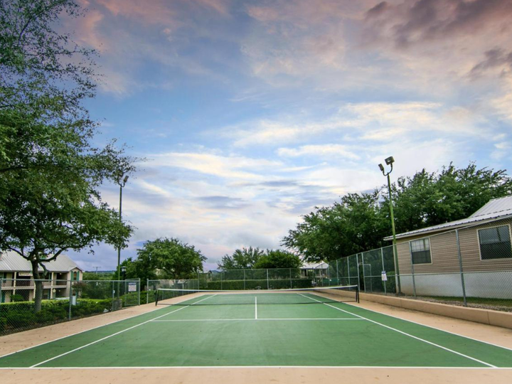 Outdoor tennis court at Hill Country Resort in Canyon Lake, Texas.