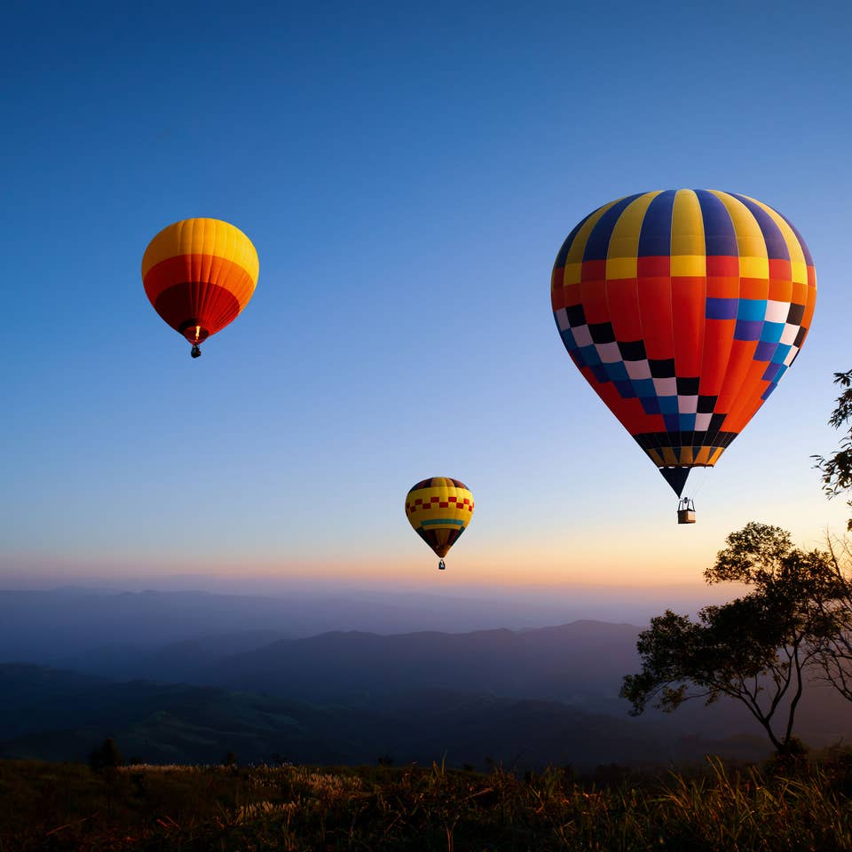 Three hot air balloons in the sky