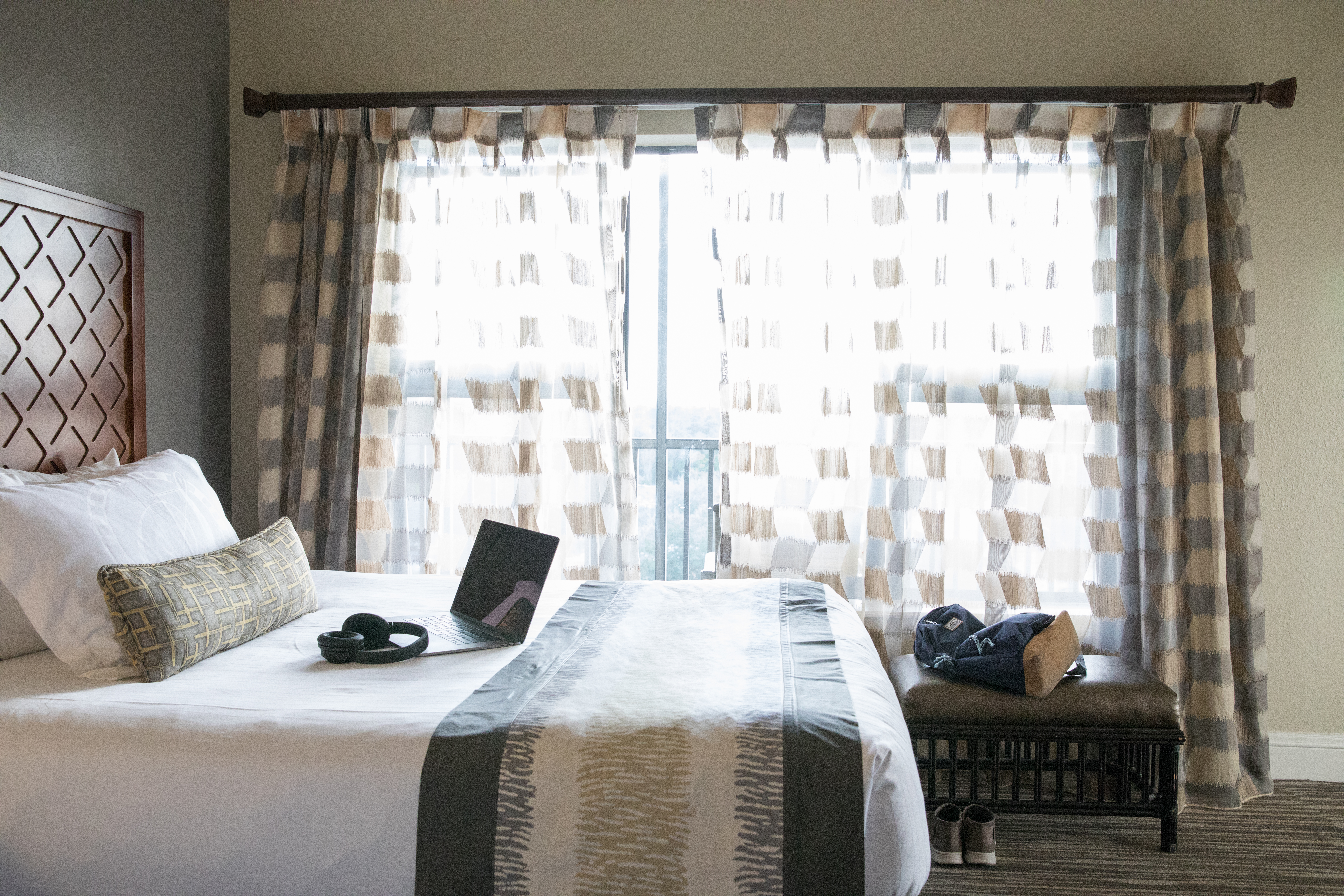 Bedroom with large window in a four bedroom Signature villa in River Island at Orange Lake Resort near Orlando, Florida
