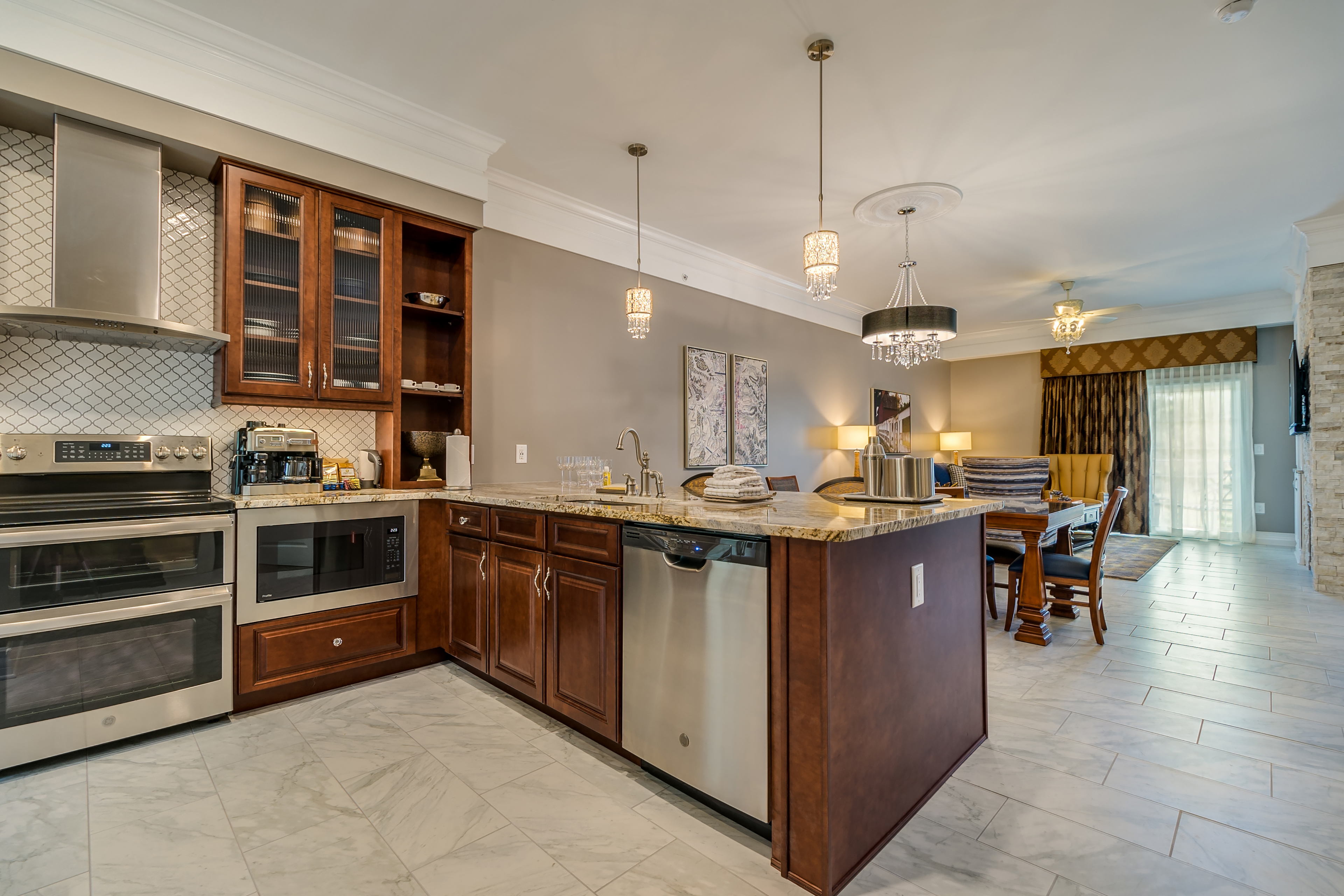 Kitchen with stainless steel appliances in a Signature Collection villa at Williamsburg Resort.