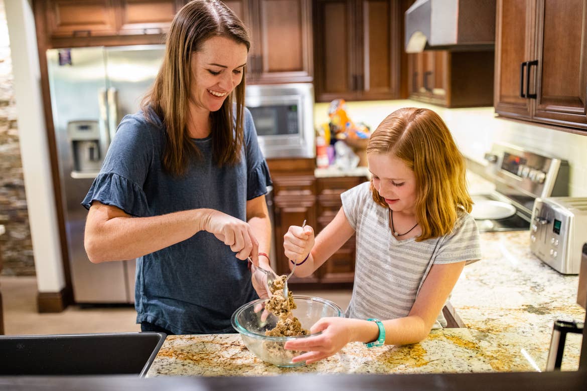 Jessica Averett and her daughter bake cookies at our Scottsdale Resort kitchen.